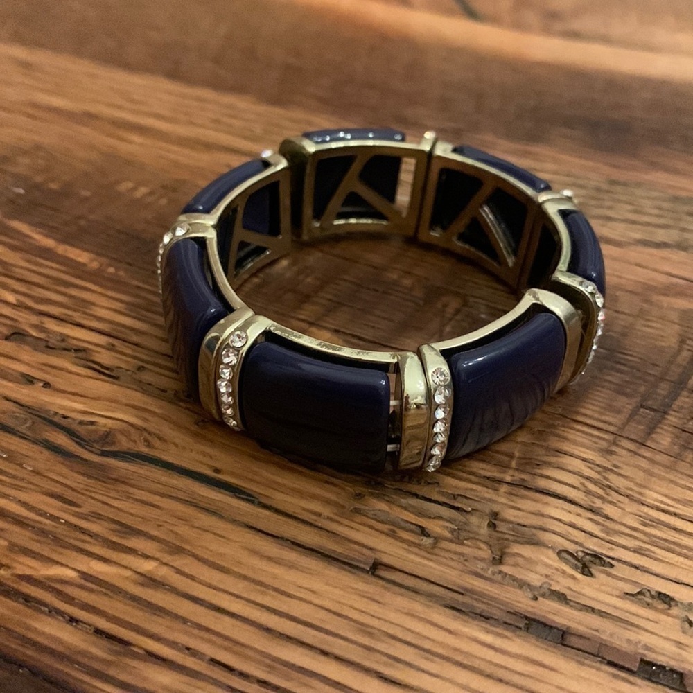 WOMEN’S gold and navy stretch bangle.